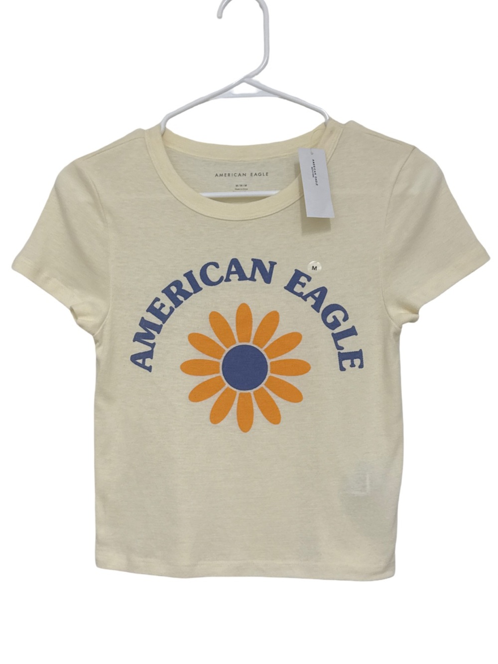 American Eagle Outfitters Cream Graphic Daisy Logo  Crop Top Women’s Medium NWT!